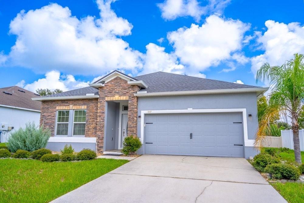 Photo of 347 Gladesdale Street, Haines City, FL 33844 (MLS # O6438198)