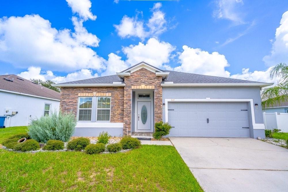 Photo of 347 Gladesdale Street, Haines City, FL 33844 (MLS # O6438198)