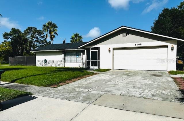 A gorgeous 4-bedroom, 2-bathroom, solid block construction, 2 car garage attached home with an in-ground swimming pool. Fenced in yard, and with no rear neighbors! New Roof 2025, New A/C 2020, New pool motor 2021, New water heater 2021 and new sprinkler system 2020. Great for that owner occupant who enjoys entertaining family & friends while watching a sunset in the PRIVACY of a scenic backyard! Nicely landscaped with palm trees! No HOA fees mandatory! Conveniently located near outlet retail shopping.