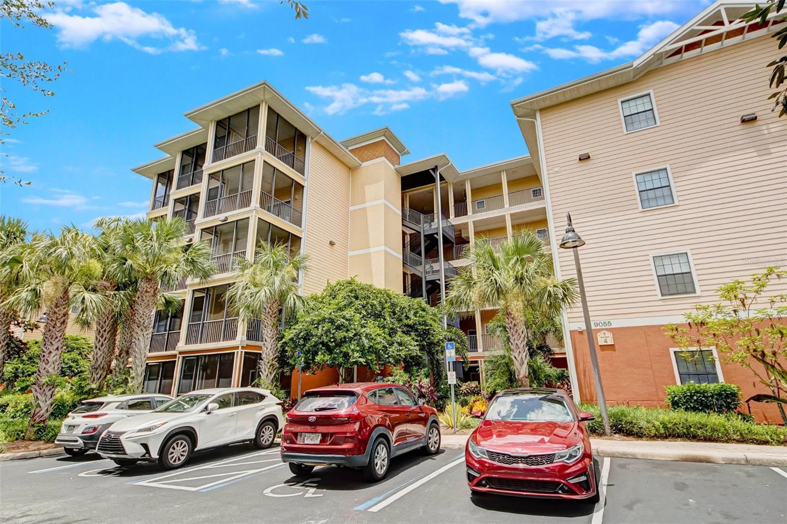 Spacious Corner Unit Condo in Resort-Style Gated Community – Fully Furnished & Move-In Ready! Welcome to this beautifully appointed 2-bedroom, 2-bathroom corner unit located on the top floor of an elevator building in the heart of Kissimmee! With 1,445 square feet of well-designed living space, this condo offers an open floor plan perfect for entertaining and everyday living. Step inside to find oversized bedrooms, walk-in closets, and a spacious laundry/storage room, all complemented by tasteful furnishings—all included for your convenience. The expansive kitchen, dining, and living areas flow seamlessly and open up to two private balconies, offering conservation views and added privacy. Enjoy the peace of mind of a new A/C installed in 2022 and the ease of an elevator-equipped building. This gated resort community features resort-style amenities including a sparkling pool, clubhouse, and more. The HOA covers cable, internet, phone, and water, making ownership stress-free and cost-effective. Whether you're looking for a short-term rental, long-term investment, or a primary residence, this versatile unit is ready to meet your needs. Plus, you’ll love being close to shopping, dining, cinemas, and world-famous theme park attractions. Don’t miss this opportunity to own one of the most spacious and private condos in the area—schedule your showing today!