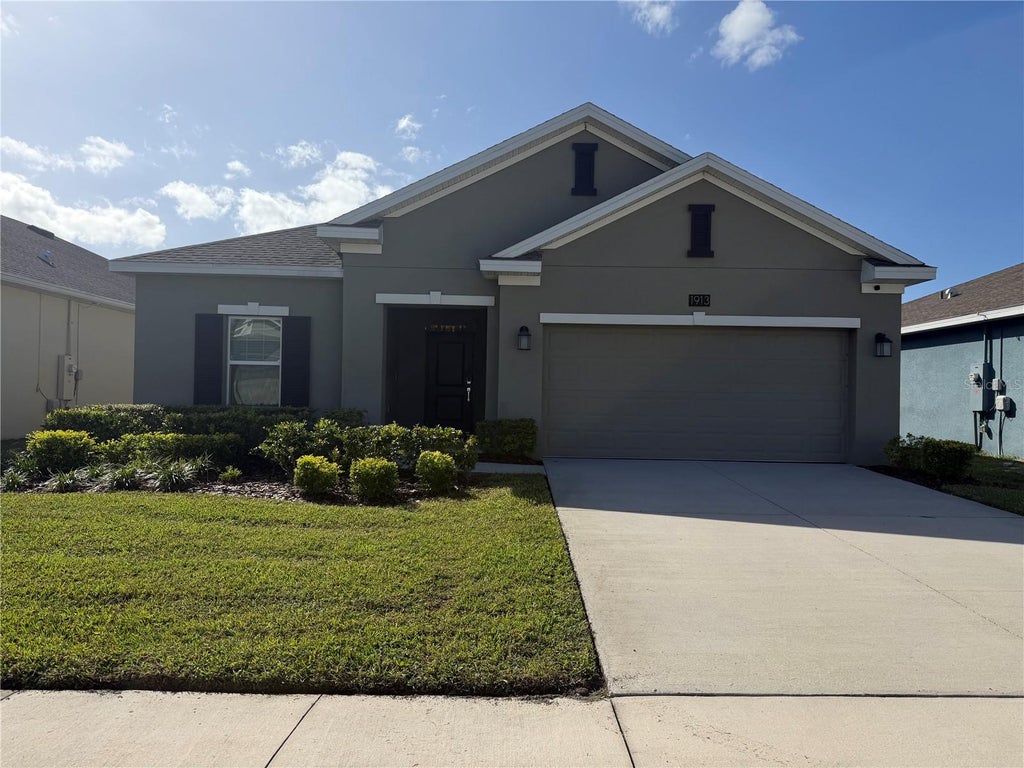 Photo of 1913 Cricket Cradle Drive, Kissimmee, FL 34746 (MLS # O6452540)