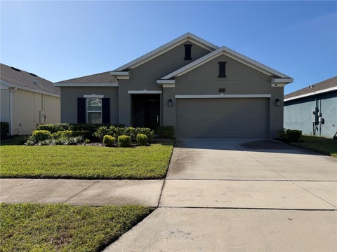Photo of 1913 Cricket Cradle Drive, Kissimmee, FL 34746 (MLS # O6452540)
