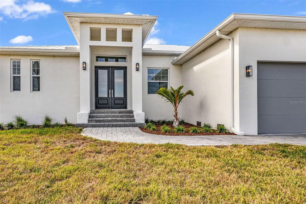 Photo of 8086 Clyde Circle, Port Charlotte, FL 33981 (MLS # C7518593)