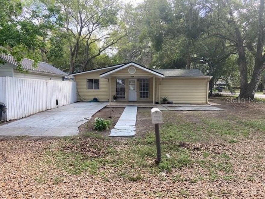 This charming home is located in the heart of Zephyrhills and comes with no HOA or CDD fees. The open floor plan welcomes you into a spacious living area, creating a comfortable and inviting atmosphere. To the left, you’ll find the kitchen, which offers plenty of cabinet space for storage and convenience.

The home also features additional flexible spaces that can be used for a home office, hobby area, or extra seating. Step outside to enjoy the paved patio, a perfect spot for relaxing or entertaining with plenty of room to spread out and enjoy the outdoors.