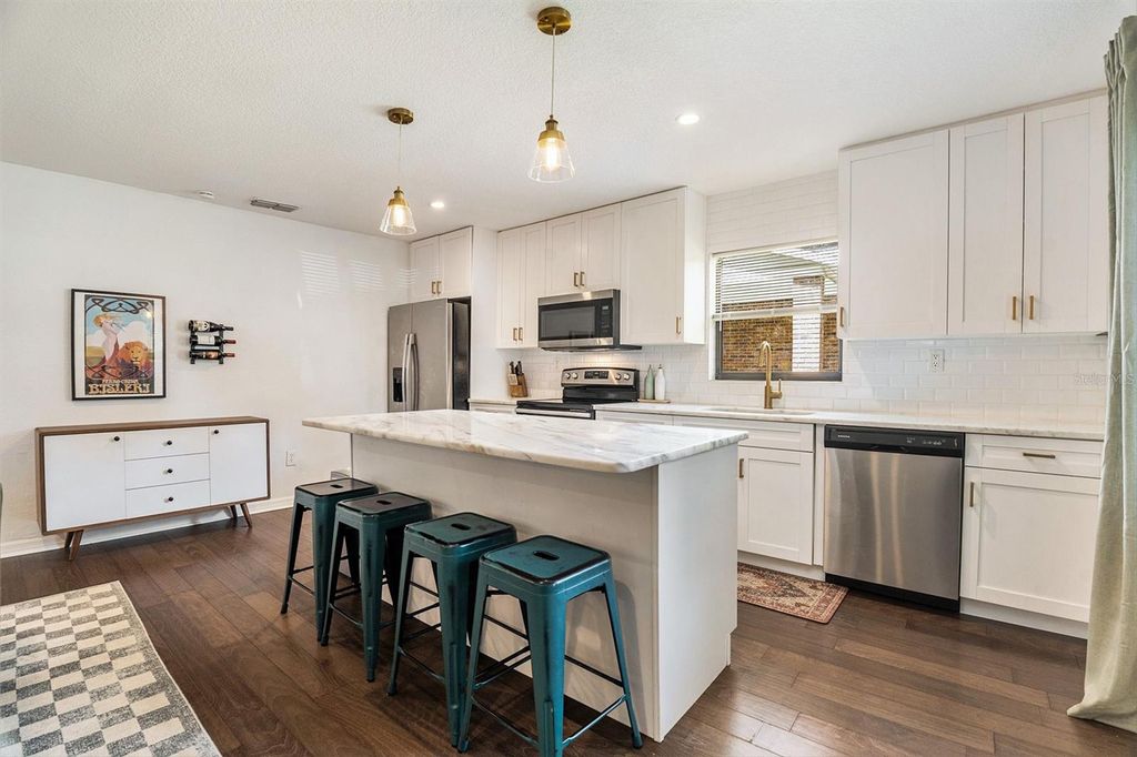 Photo of 2017 E Henry Avenue, Tampa, FL 33610 (MLS # TB8430296)
