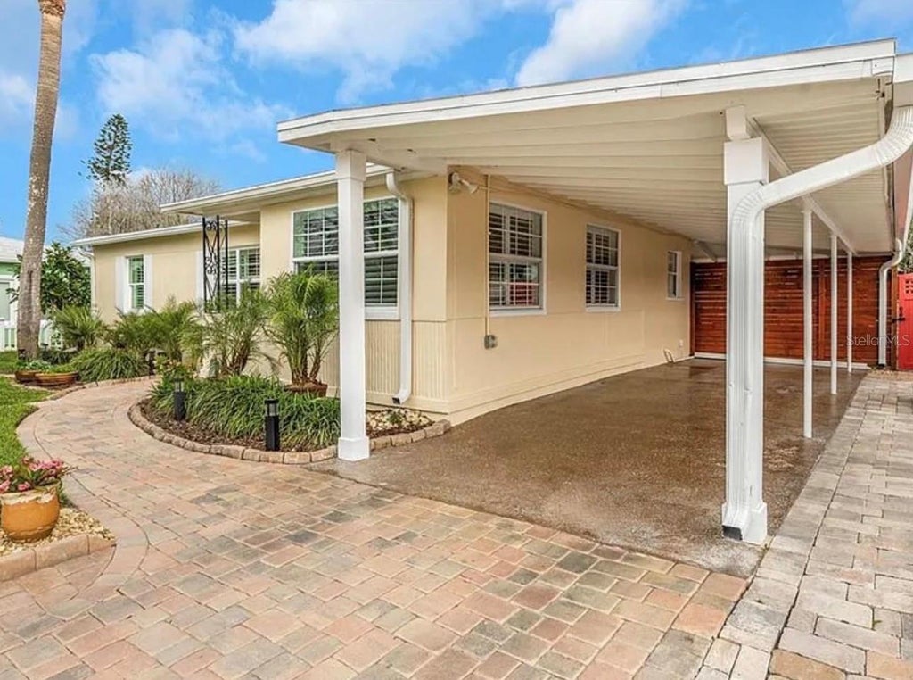 Photo of 550 80th Avenue, St Pete Beach, FL 33706 (MLS # TB8556619)