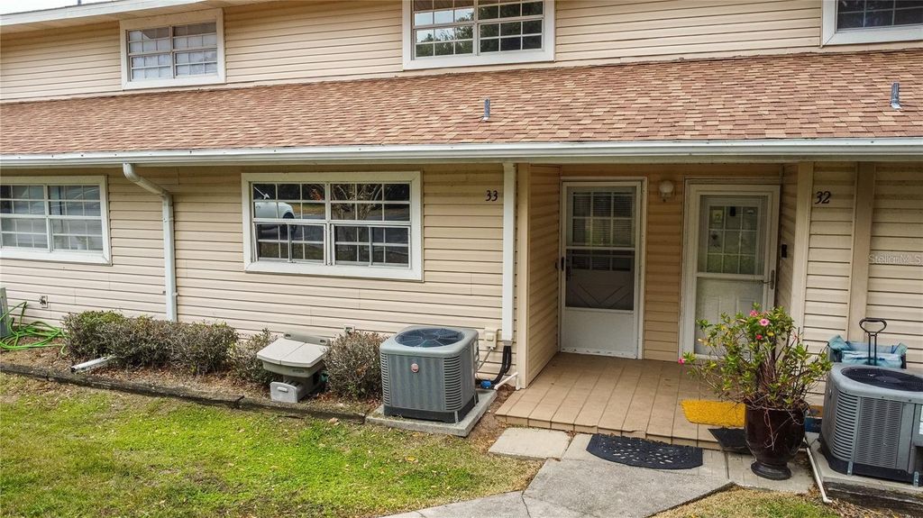 Photo of 11001 SE Sunset Harbor Road #E 33, Summerfield, FL 34491 (MLS # OM716302)