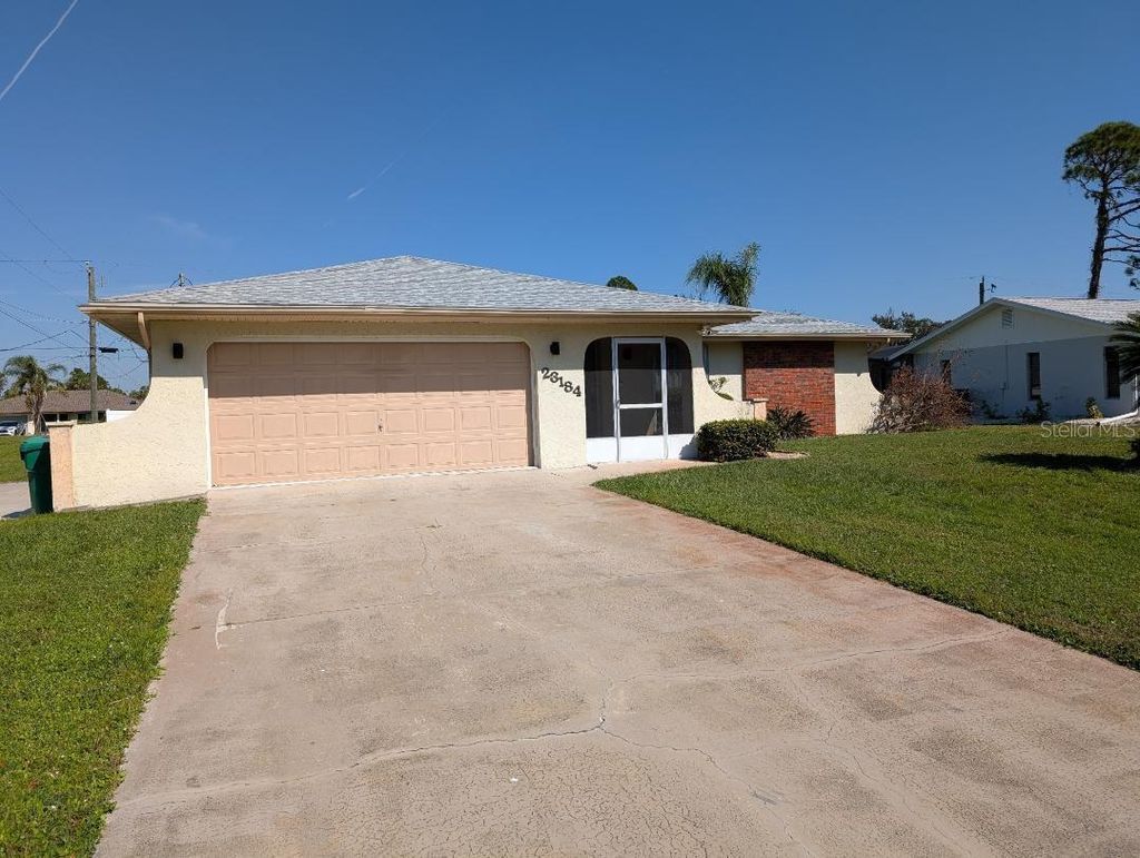 Photo of 23184 Glory Avenue, Port Charlotte, FL 33952 (MLS # C7523958)