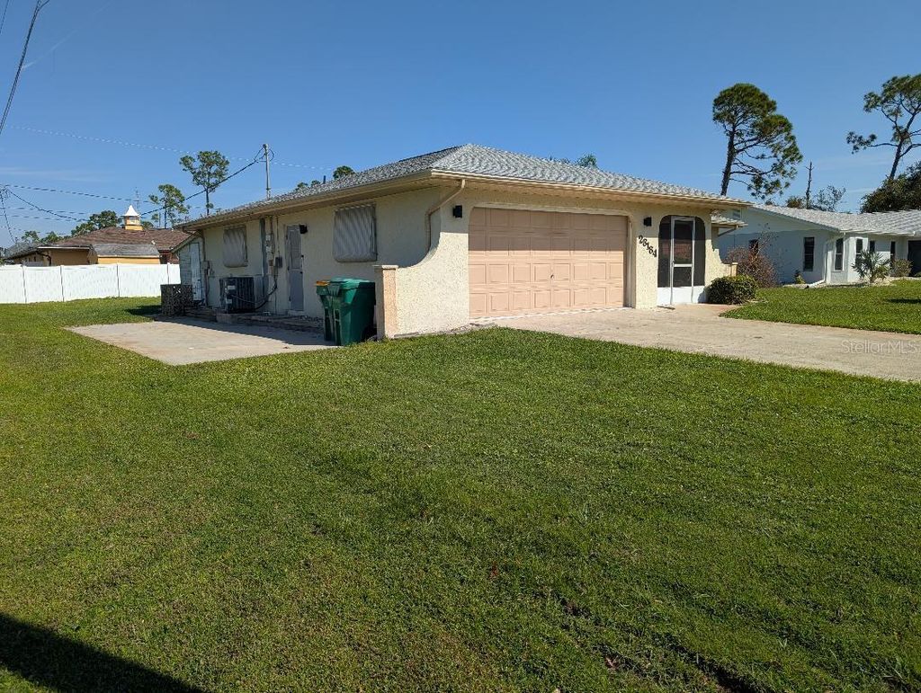 Photo of 23184 Glory Avenue, Port Charlotte, FL 33952 (MLS # C7523958)