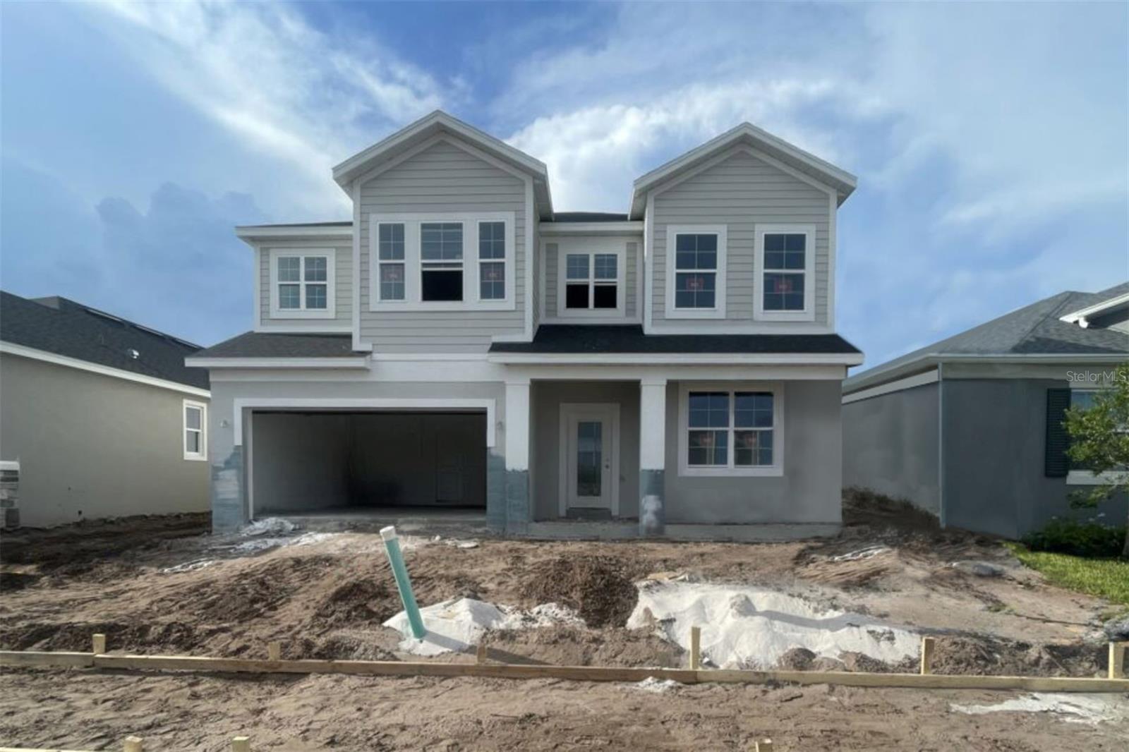Under Construction. Discover this beautiful new construction home at 5256 Teirgarten Street in Saint Cloud. This home includes 4 spacious bedrooms, 3 well-appointed bathrooms, a 26' x 10' lanai, high-quality finishes throughout, and so much more. This Saint Cloud home features an inviting open-concept living space that creates a seamless flow between the kitchen, dining, and living areas - perfect for both everyday living and entertaining guests. The intelligent layout maximizes functionality while maintaining a comfortable atmosphere. The upstairs owner's bedroom provides a private retreat with an en-suite bathroom designed for relaxation and convenience. The home's quality design is evident in every detail, from the thoughtful room placement to the carefully selected finishes. Each space has been created with both aesthetics and practicality in mind, ensuring this home will remain stylish and functional for years to come. Experience the benefits of new construction and the opportunity to be the first to create memories in this beautiful home.