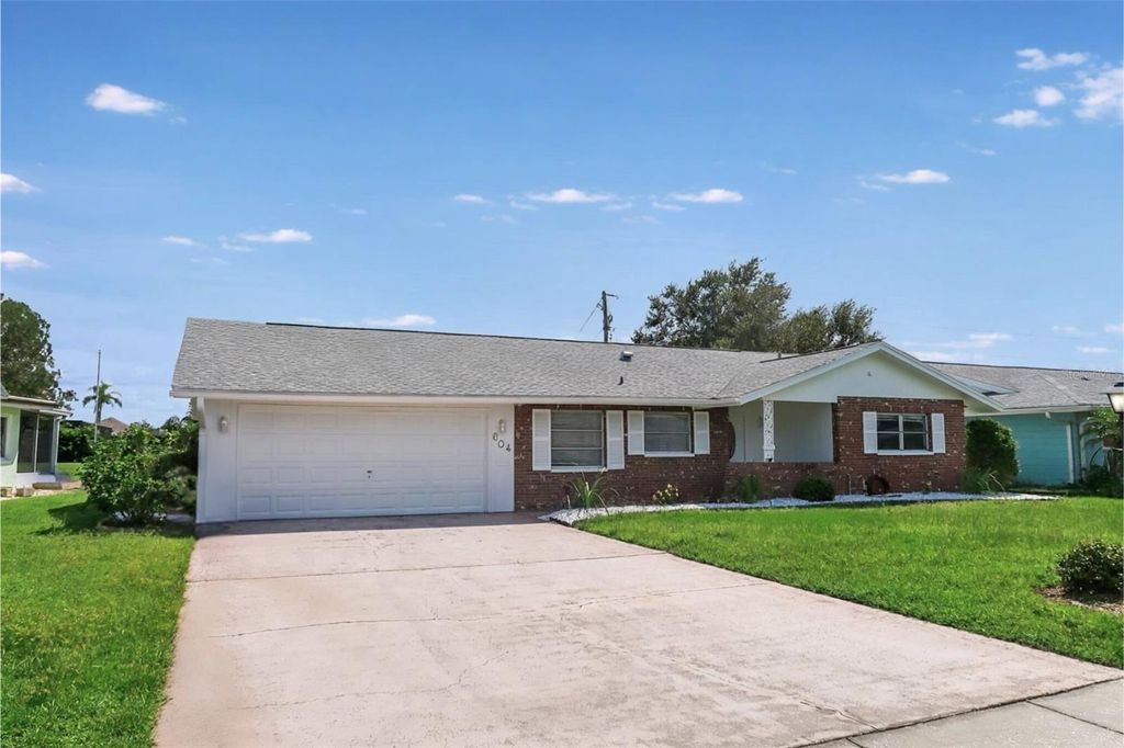 Photo of 604 Ojai Avenue, Sun City Center, FL 33573 (MLS # TB8426679)