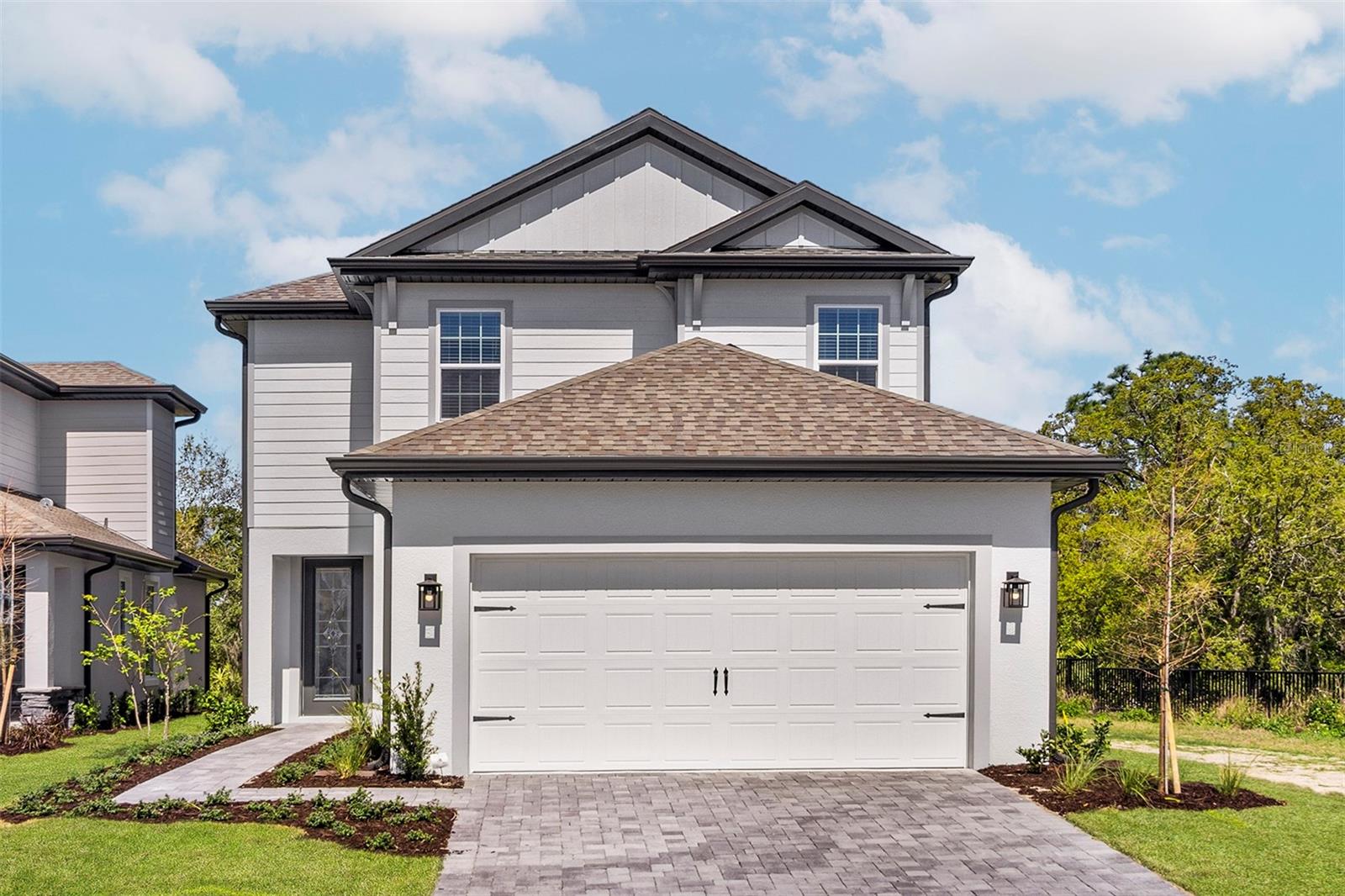 Under Construction. Welcome to The Toho, a thoughtfully designed 6-bedroom, 4.5-bathroom home that perfectly blends style, comfort, and functionality. The home’s layout is ideal for modern living, with the master bedroom conveniently located on the first floor, offering privacy and easy access to the living areas. The master suite is spacious and serene, featuring a walk-in closet and a luxurious en-suite bathroom with all the details you'd expect from a high-end home. The large kitchen is a highlight, with quartz countertops, premium appliances, and plenty of storage—perfect for both everyday cooking and entertaining. Adjacent to the kitchen is an open living space that creates a seamless flow throughout the home. Upstairs, you'll find a spacious loft area that can be used as a game room, media center, or home office. The home also features a Jack and Jill bathroom, ideal for shared access between two of the bedrooms, making this floor plan perfect for families. Enjoy the beautiful weather outdoors on the covered lanai, a great space for relaxing or hosting gatherings, and take advantage of the two-car garage and a large laundry room for extra convenience and storage. With its smart design and carefully selected upgrades, The Toho is the ideal choice for those seeking a spacious and contemporary home.