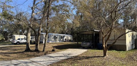 Photo of 18110 Spangler Avenue, Brooksville, FL 34604 (MLS # TB8476394)