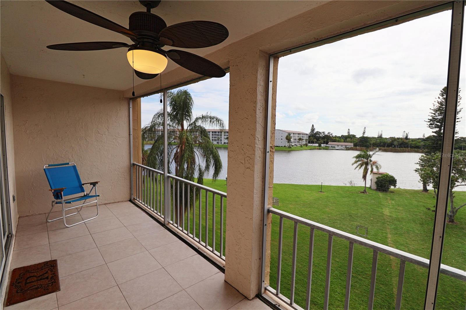 Discover this beautifully updated, fully furnished condo in the desirable Bayshore on the Lake community! You'll love the updated kitchen with granite countertops and stainless steel appliances. The furnishings, which beautifully adorn this home were perfectly matched to the property. This 55+ haven offers serene lake views, perfect for sipping your morning coffee or unwinding with an evening glass of wine on the spacious lanai. The bright paint color pallet chosen here adds life to each room and contrast nicely with the white crown moldings and baseboards. You'll find this one a delight to view. Convenience is also key here, with a stack washer and dryer tucked away in the lanai closet and nicely located just 6 miles from our stunning beaches. You'll find all the shopping and dining you need on nearby Cortez road. This is a REAL MUST-SEE! Schedule your appointment today!
