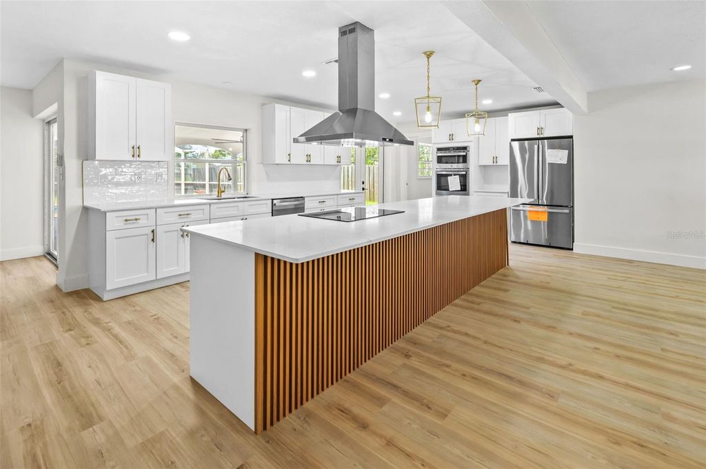 Photo of 5700 Bayou Grande Boulevard NE, St Petersburg, FL 33703 (MLS # TB8500937)