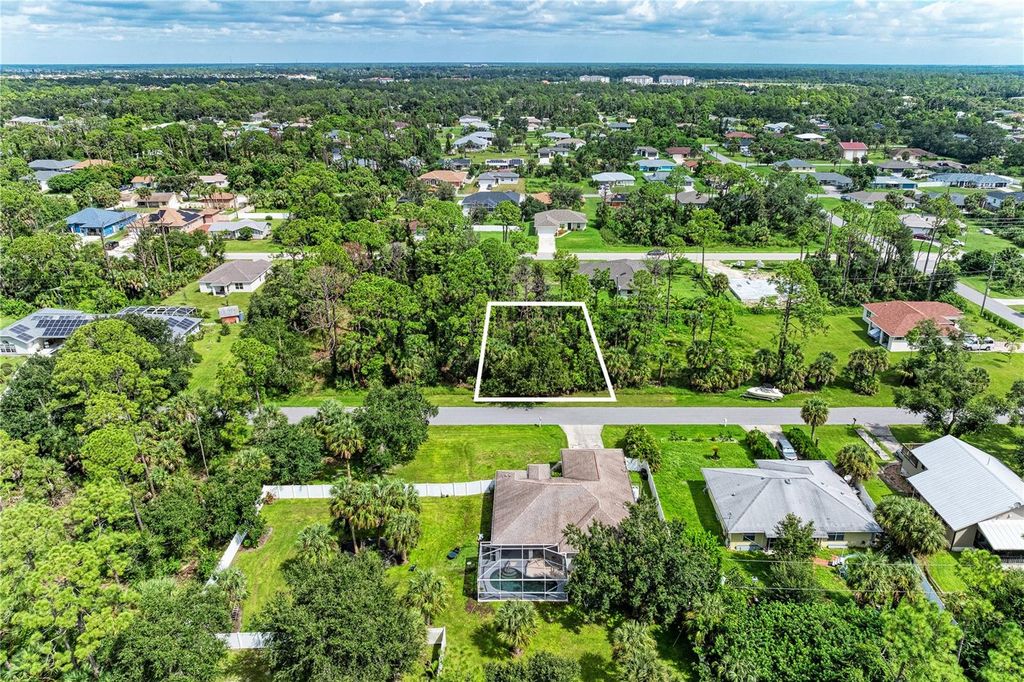 Photo of 15106 Gulistan Avenue, Port Charlotte, FL 33953 (MLS # TB8425699)