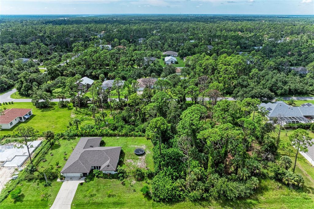 Photo of 15106 Gulistan Avenue, Port Charlotte, FL 33953 (MLS # TB8425699)