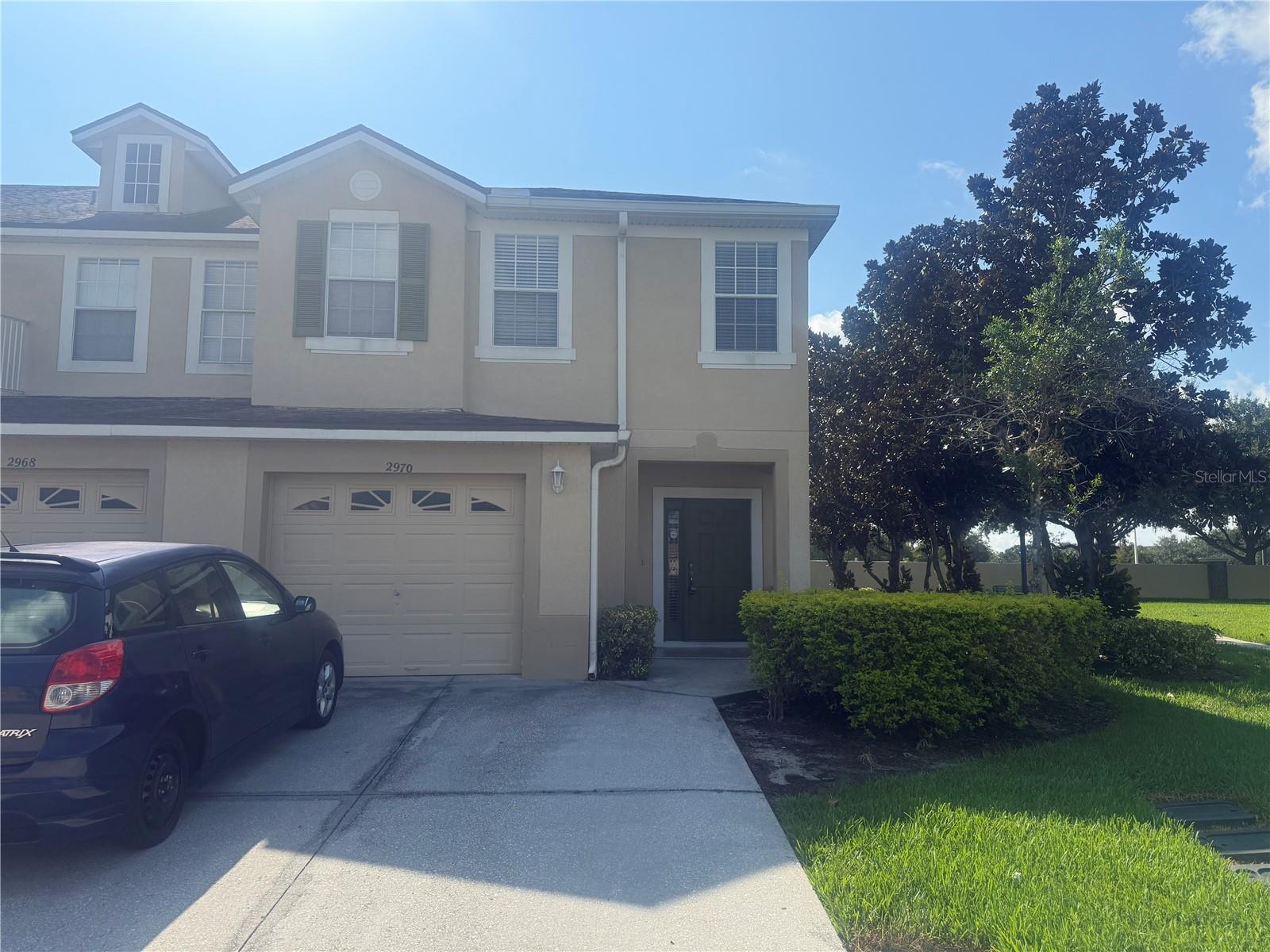 Welcome to this beautiful 3 bedroom, 2.5 bath end -unit townhouse !!! located in the GATED COMMUNITY OF TOWNHOMES OF FLORA RIDGE . Ideally situated near THE LOOP SHOPPING CENTER, restaurants, Lowe's, medical center, hospital, major highways, and with quick access to DISNEY PARKS- This is the perfect place to call home. This spacious home features CERAMIC TILE FLOORING THROUGHOUT both floors And offers plenty of NATURA LIGHT thanks to its corner location with extra windows. Enjoy peaceful morning and evening on your COVERED PORCH overlooking GREEN AREAS , PLAYGROUND,AND POOL COMUNITY! creating a serene and family - friendly atmosphere. The community is quiet, well-maintained, and offers the convenience and security you deserve in an unbeatable location. Don't miss the chance to live one of the most convenient areas of Kissimmee. SCHEDULE YOUR PRIVATE SHOWING AND SEE EVERITHING THIS BEAUTIFUL TOWNHOUSE!