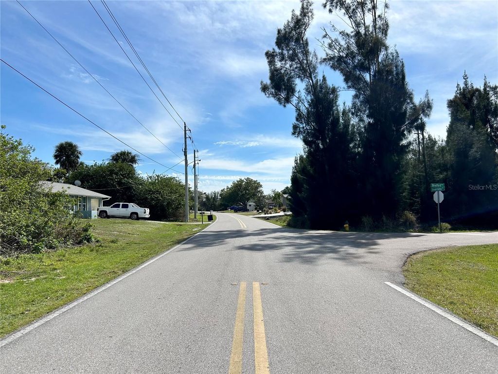 Photo of 1032 Inverness St, Port Charlotte, FL 33952 (MLS # C7506123)