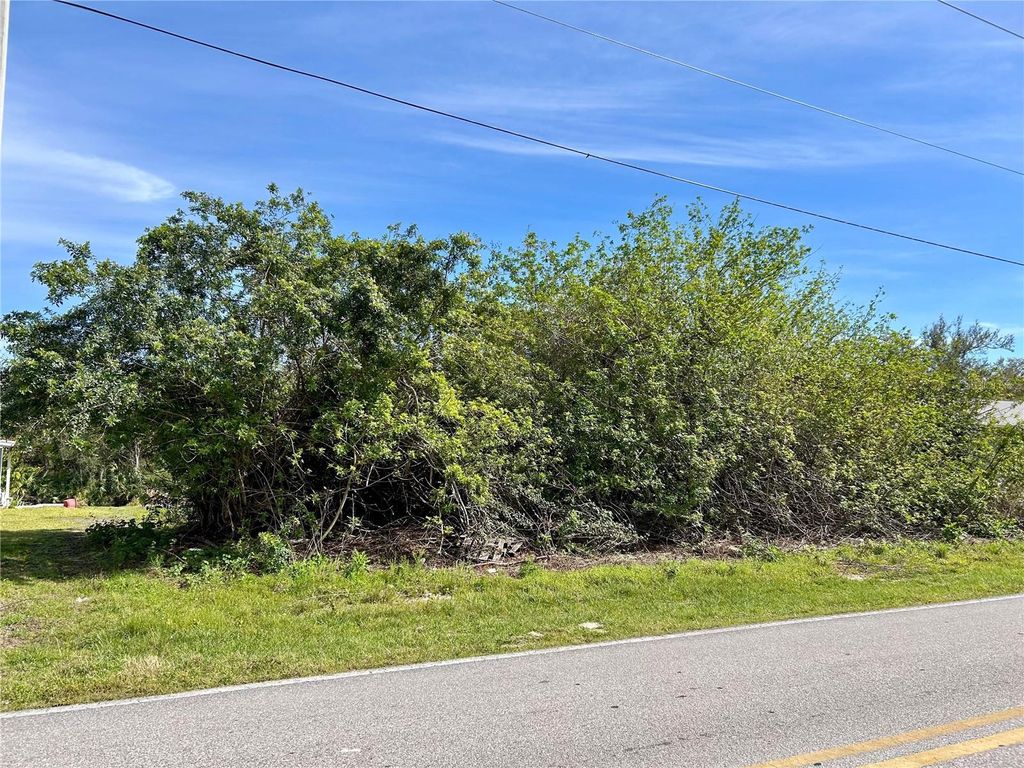 Photo of 1032 Inverness St, Port Charlotte, FL 33952 (MLS # C7506123)