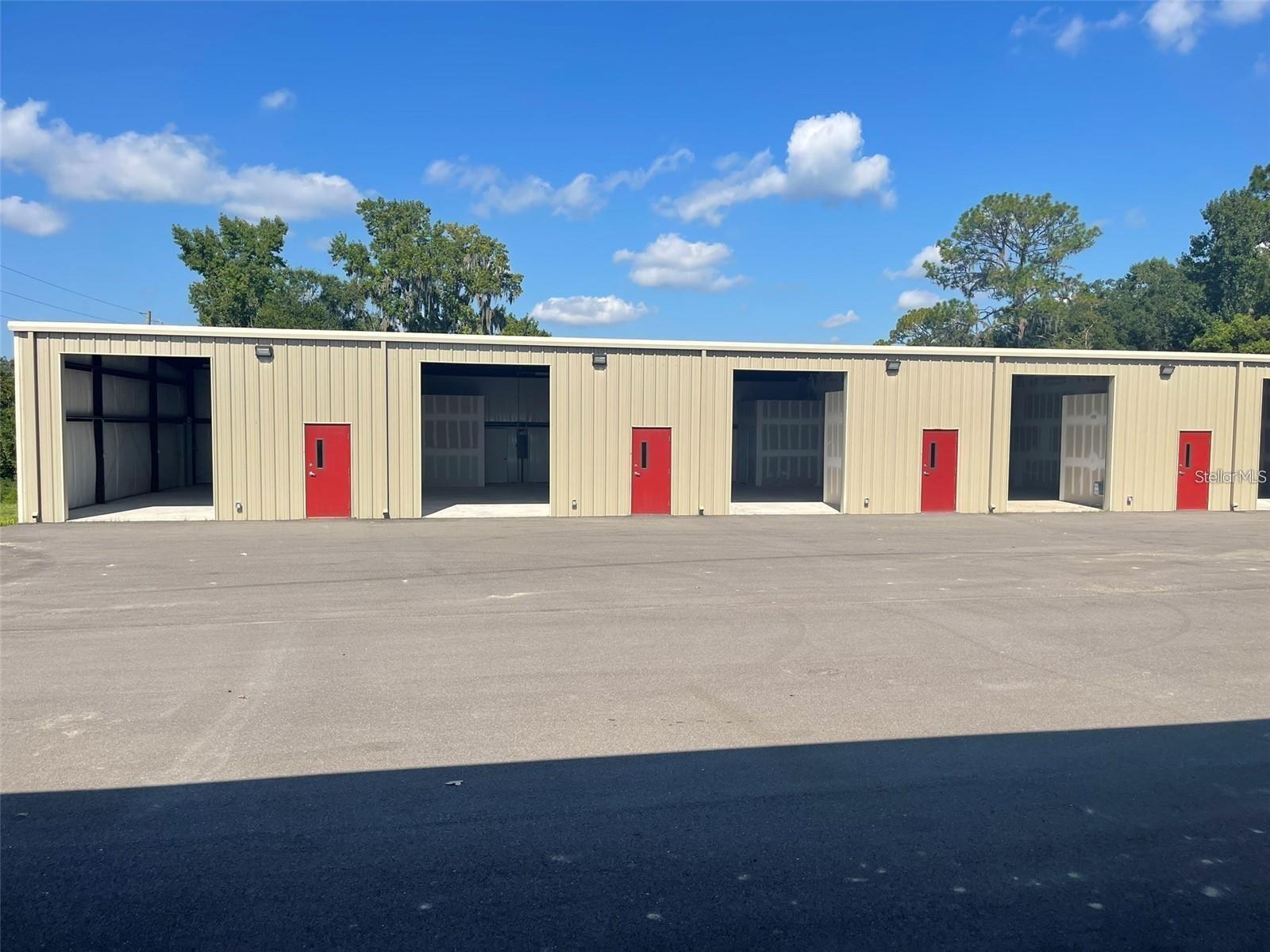 ** ONE MONTH FREE RENT ** Each warehouse boasts convenient roll-front bay doors, thoughtfully appointed offices, and modern bathroom facilities. Abundant parking space ensures hassle-free access for both employees and clients, while the prime highway frontage enhances visibility and connectivity. All commercial tenants are subject to a $100 non-refundable application fee.