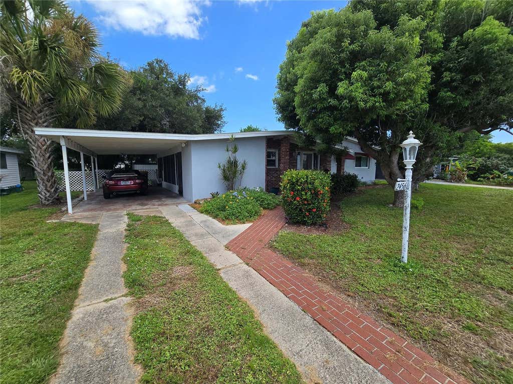 Photo of 2456 Ednor Street, Port Charlotte, FL 33952 (MLS # C7529689)