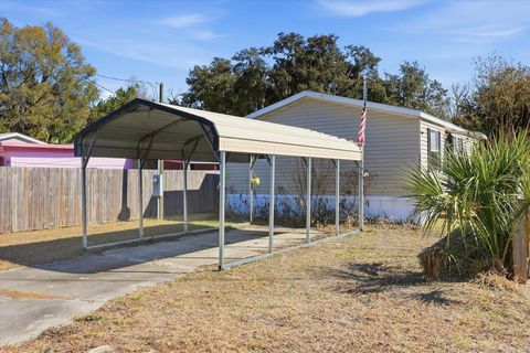 Photo of 4025 N Bluewater Drive, Hernando, FL 34442 (MLS # W7883080)