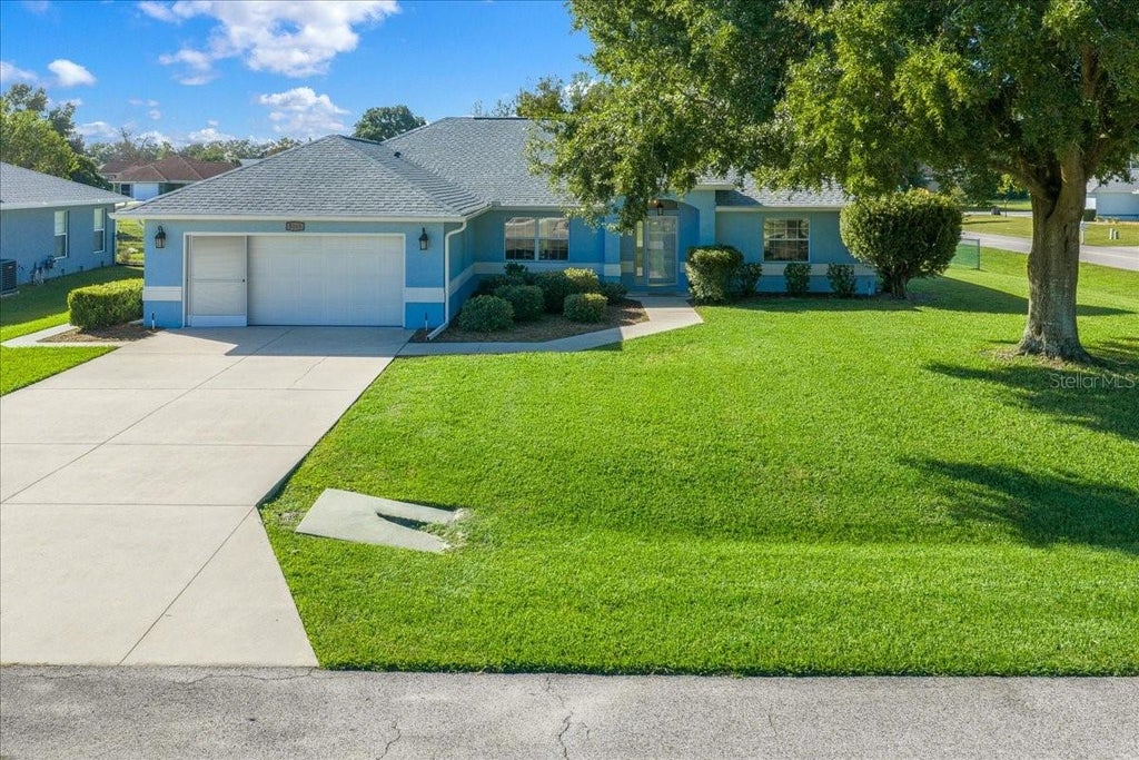 Photo of 5048 NW 32nd Place, Ocala, FL 34482 (MLS # OM734417)