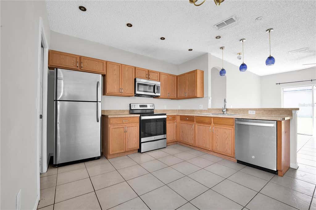 Photo of 433 Lakeview Road, Poinciana, FL 34759 (MLS # O6433226)