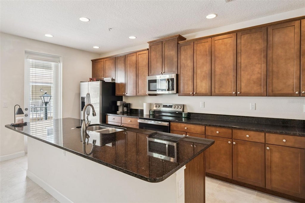 Photo of 669 Hangnest Lane, Lake Mary, FL 32746 (MLS # O6440412)
