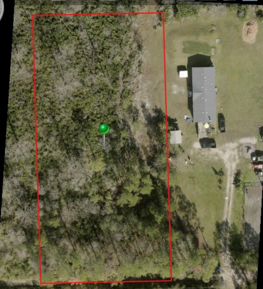 Fantastic opportunity 1.25 acres level wooded lot located in The Ranchette rd area of New Smyrna Beach with no deed restrictions close to conveniences but away from the hustle and bustle…a little slice of peace. Street view of neighborhood in video link.