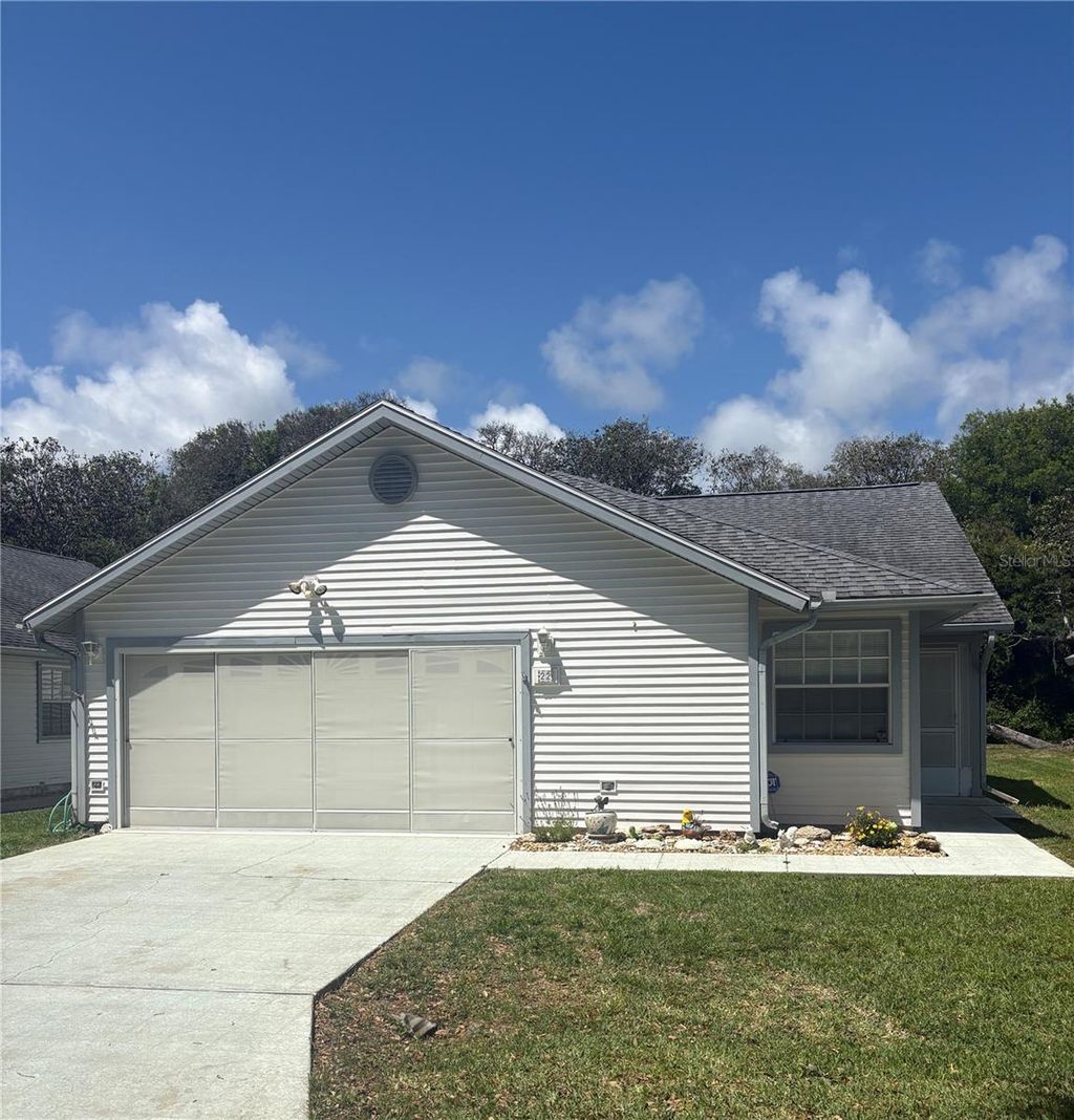 Photo of 22 Bristol Drive, Palm Coast, FL 32137 (MLS # FC318137)