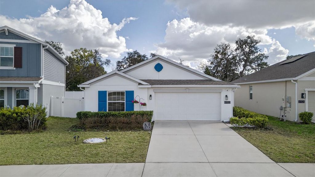 Photo of 6922 Perch Hammock Loop, Groveland, FL 34736 (MLS # O6387157)