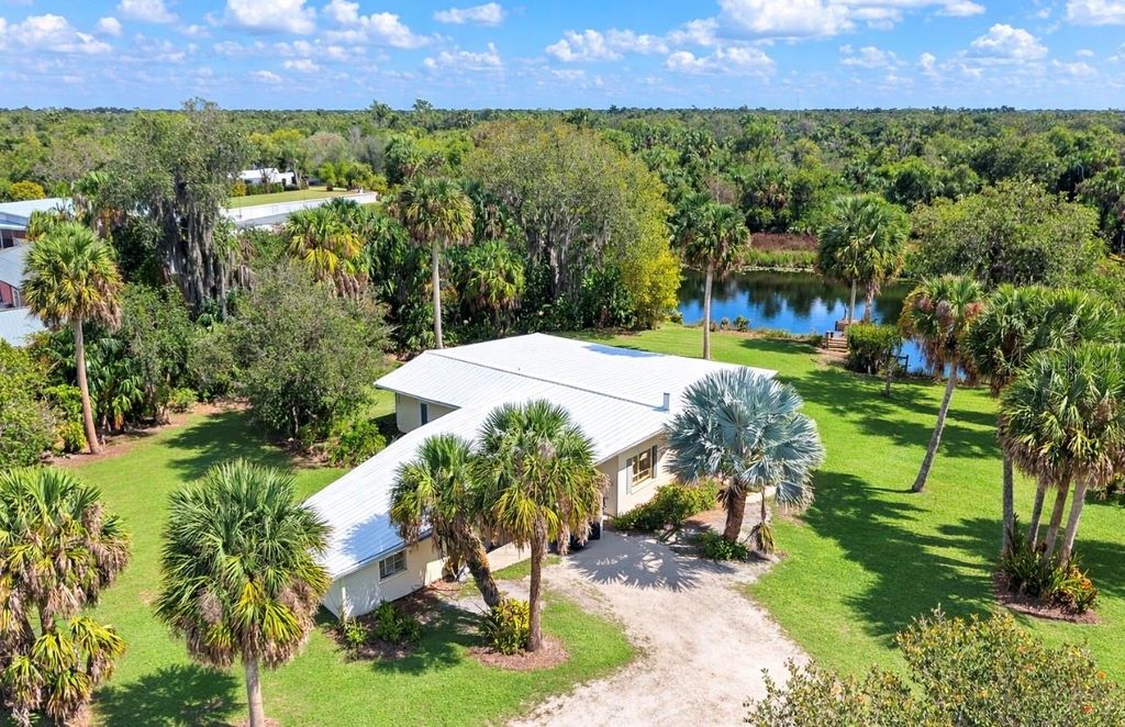 Photo of 33101 Serene Drive, Punta Gorda, FL 33982 (MLS # D6146399)