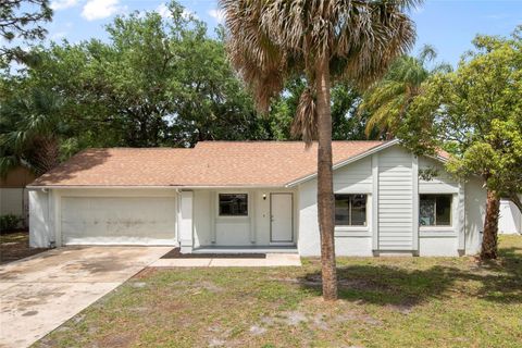 Photo of 10722 Whisperwood Lane, Orlando, FL 32837 (MLS # O6399129)