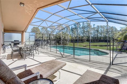 Photo of 927 Orange Cosmos Boulevard, Davenport, FL 33837 (MLS # O6311521)
