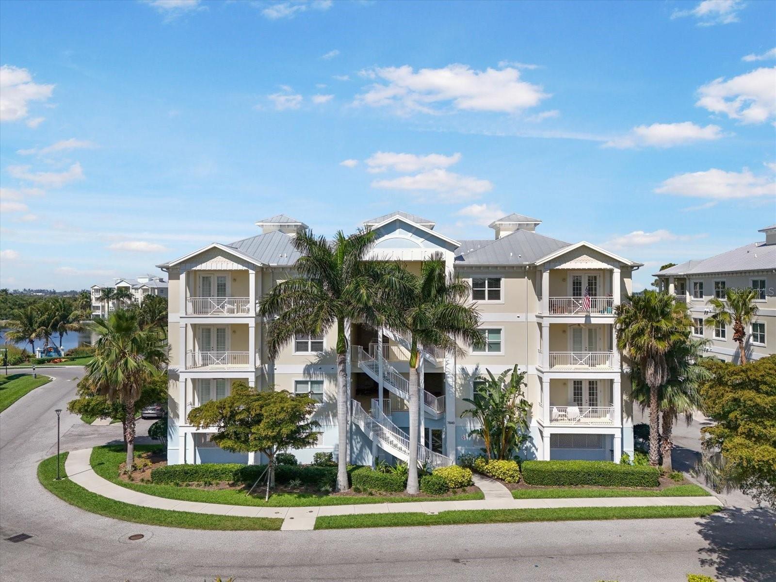 Coveted 3rd-Floor, turnkey furnished, Condo with Spectacular Water Views!!!
Welcome to your furnished coastal retreat at beautiful Palma Sola Bay Club, where luxury, comfort, and tranquility come together in one of Bradenton’s most sought-after communities. This top-floor 3-bedroom, 2.5-bath condo offers breathtaking panoramic views of Palma Sola Bay, with the rare advantage of two private balconies—perfectly positioned to capture both morning light and golden Gulf sunsets.
Step inside to a spacious, light-filled open-concept layout with expansive bay views, flowing effortlessly from the living and dining areas into a gourmet kitchen. Equipped with premium stainless-steel appliances, granite countertops, custom cabinetry, and a large center island, this kitchen is a dream for both casual mornings and elegant entertaining.
The primary suite is your personal haven, where morning sunlight dances through the windows. Sip your coffee and enjoy a favorite book on your private balcony overlooking one of the community’s tranquil lagoons. Ready to rejuvenate? The spa-like en suite bath features a large soaking tub, glass-enclosed rain shower, dual vanities, and a custom California Closets-designed walk-in closet. Two additional bedrooms offer comfort and privacy for guests or family, each thoughtfully appointed with custom storage and water views.
As the day unwinds, the second balcony becomes your front-row seat to nature’s grandest show. A glass of wine, or your favorite beverage in hand, you watch the sun dip into the bay, golden light glinting off the water. Dolphins glide by in the distance. Ospreys call overhead. Life slows to take a breath.
Throughout the home, thoughtful upgrades abound, including electric blinds, crown molding, 10-foot ceilings, wood-grain tile flooring, an upgraded appliance package, a spacious utility closet, and abundant natural light pouring in from every angle.
This unit is more than a home—it’s a lifestyle. Elevated and serene, with no one above you, you’ll feel the difference in the stillness, the lightness, the sense of space.
Palma Sola Bay Club offers resort-style amenities including a sparkling pool, fitness center, elegant clubhouse, kayak launch, community dock, dog park, walking trails, and lush tropical landscaping. Located just minutes from the powder-soft beaches of Anna Maria Island, as well as world-class golf, shopping, dining, and cultural attractions, you’ll enjoy the very best of Florida’s Gulf Coast.
Whether you’re hosting a seafood dinner with friends, kayaking at sunset, or enjoying a peaceful walk with your pup, every moment here feels intentional.
This isn’t just another condo, it’s your sanctuary above it all.
Schedule your private tour today and discover the magic of living at Palma Sola Bay Club.