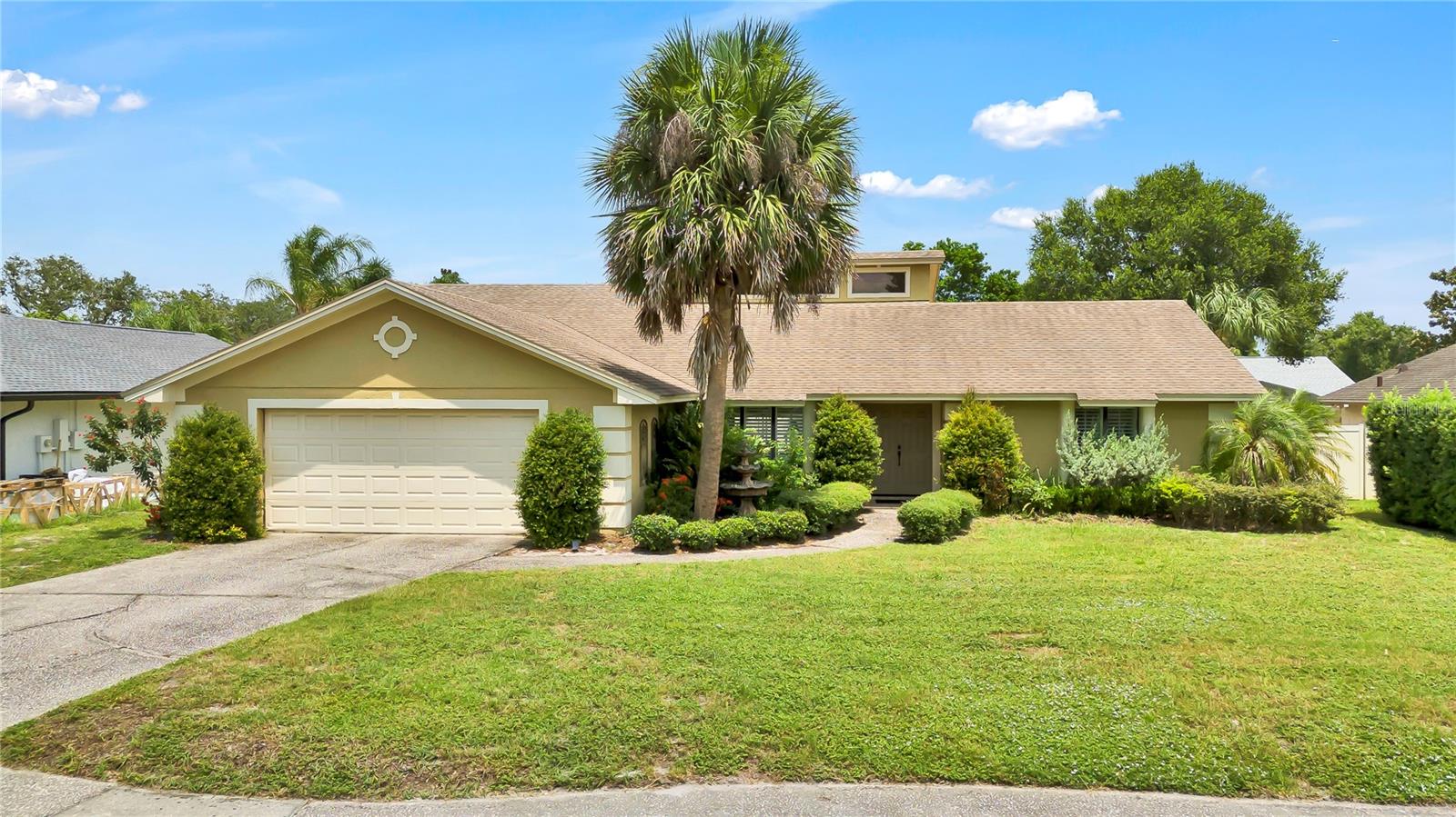 Under contract-accepting backup offers. Welcome to your new home in Hidden Springs, located in the heart of the highly sought-after Dr. Phillips area of Orlando. This property, set on a spacious .25+acre lot, boasts a wonderful floor plan and a pool. With its open-concept design, the home offers a bright and spacious living area, highlighted by vaulted ceilings. A cozy wood-burning fireplace, surrounded by rustic lime stone, serves as a stunning focal point in the living room. Enjoy the remodeled kitchen features granite countertops, high-end solid-wood cabinetry, tile backsplash, updated fixtures, and stainless steel appliances. The home is situated on a large, fully fenced lot, offering privacy and ample space for outdoor activities. Step outside to an oversized screened lanai, ideal for relaxing, entertaining, or enjoying your pool. This area provides a tranquil setting while enjoying the Florida weather. This home combines the perfect blend of character, modern amenities, and property boasts a prime location, offering effortless access to numerous shopping, dining, and entertainment options, local theme parks, golf courses, and major highways within the vibrant and desirable Dr. Phillips neighborhood. Don't miss your chance to own this stunning home!