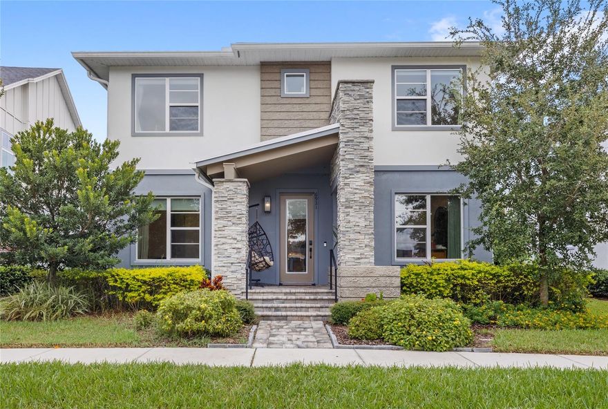 Welcome to Laureate Park - one of Orlando’s premier communities - where this stunning former Cardel Homes model home - The Symphony model at 6921 Arnoldson Street - offers 4 bedrooms and 3 full bathrooms, totaling 3,111 sqft. The home features a second-floor primary suite, an oversized loft, a first-floor guest bedroom, and a flex room/office. The floor plan offers ample space and highly intentional design making this home suitable for virtually every buyer. Upgrades are abundant and include, but are not limited to: A gourmet kitchen with upgraded fixtures and appliances, upgraded cabinets, premium counter-to-ceiling tile backsplash, high-end textured wallpaper, custom built-ins in the pantry and closets, sliding glass pocket doors, a paver patio with a built-in summer kitchen, an underground invisible fence, and so much more. The primary en-suite includes a freestanding soaking tub, frameless glass shower and two walk-in closets. Both the main home and the apartment are powered by a 35-panel whole-home solar system - installed in January 2024 - reducing energy costs and stacking savings! This home is zoned for Laureate Park Elementary, Lake Nona Middle School and Lake Nona High School - all A-rated Orange County public schools! Take advantage of Laureate Park’s community amenities, including multiple playgrounds, two resort style pools, a fitness center, walking trails, a community garden, and more! Enjoy the open courtyard at Merit Park directly across the street, or take a short walk to Amanda Linear Park and the Laureate Park Nature Trailhead, just minutes from your front door. Within a 10-minute commute, you'll have easy access to Lake Nona Town Center, Orlando International Airport, and the University of Central Florida’s College of Medicine. Enjoy local favorites including Foxtail Coffee, Canvas Restaurant & Market, Boxi Park, Chroma Modern Bar & Kitchen, and more! Local medical facilities include UCF Lake Nona Hospital (HCA,) Nemours Children’s Hospital, Ronald McDonald House, the Orlando VA Medical Center (the nation’s largest VA,) and the brand new Advent Health Lake Nona ER (projected completion Fall 2026.) To top it off, you’ll be located within a short drive to Orlando’s world famous attractions - 20 minutes to Walt Disney World, 25 minutes to Universal Studios, and 25 minutes to Downtown Orlando. This home is the complete package - Contact us to schedule your private viewing today! **Please note, this rental listing is for the MAIN HOME ONLY and does NOT include the apartment above the garage.**