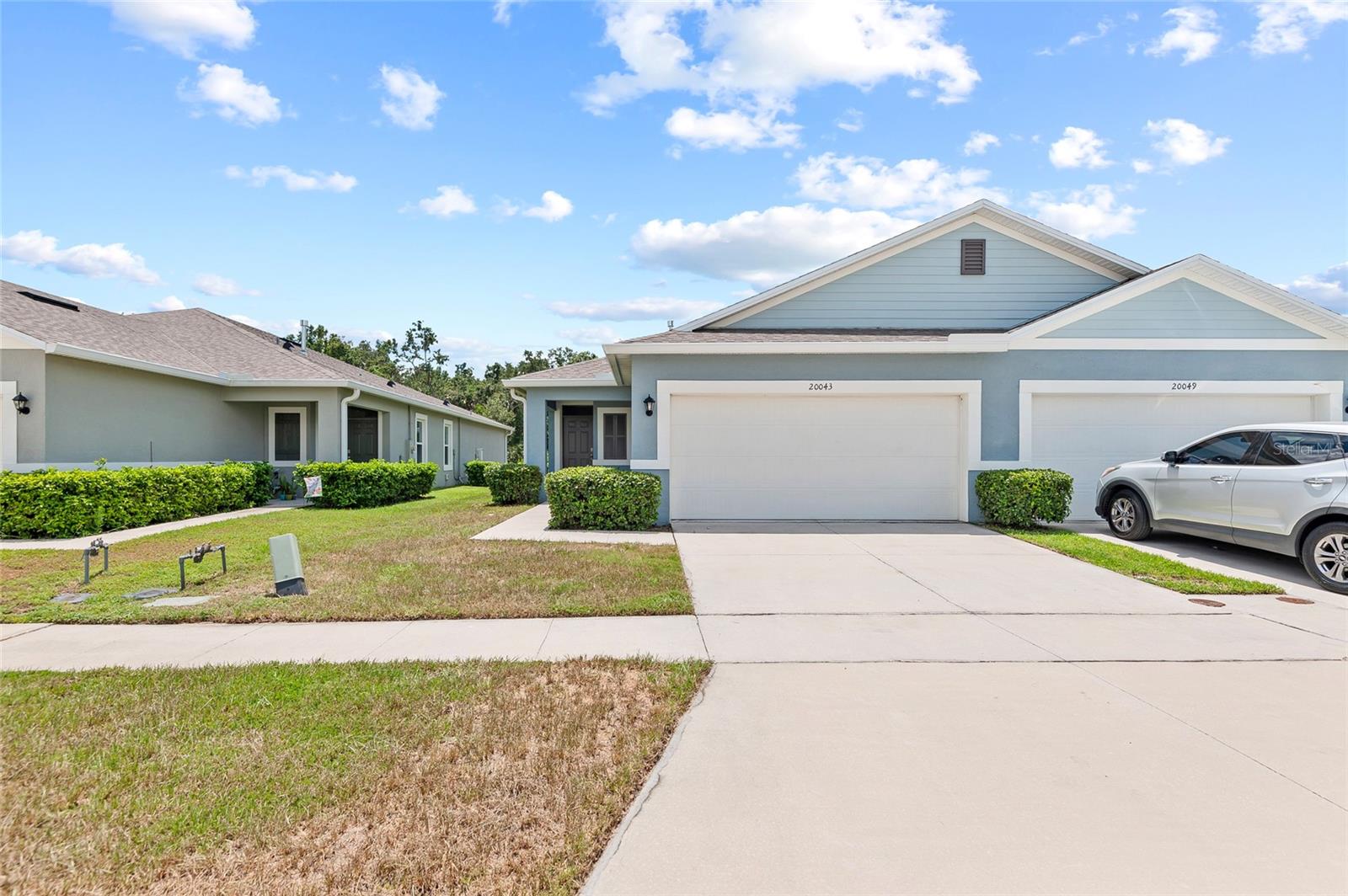 Like new home with a den and 2-car garage in Lake Denham Estates. Built in 2022, this home features an open floor plan, spacious living and dining areas, and a modern kitchen with center island, stainless steel appliances, pantry, and ample cabinet space. The split-bedroom layout includes a large primary suite with two walk-in closets and en-suite bath. The flexible den can serve as an office or additional living space. Enjoy the screened covered lanai with no rear neighbors and wooded views. Located just one lot from the community pool. Minutes from shopping, restaurants, Lake Harris boat ramp, Griffin State Park, downtown Leesburg, and the Turnpike. Book your showing today!