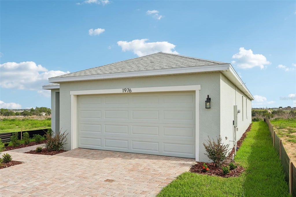 Photo of 1976 Diamond Head Circle, Haines City, FL 33844 (MLS # O6418785)
