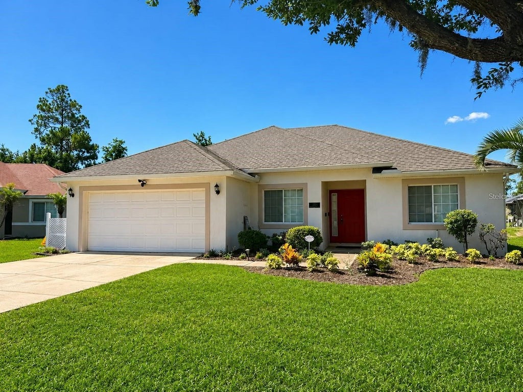 Photo of 320 Paradise Woods Place, Davenport, FL 33896 (MLS # O6447788)