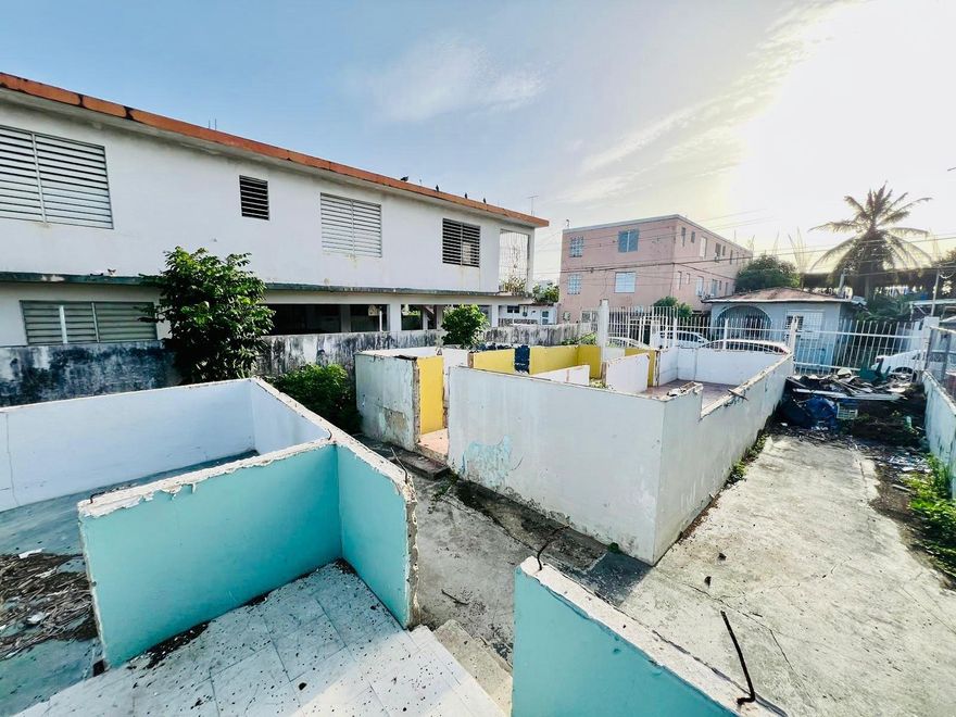 Lot at 225 Ruiz Belvis St. 270.00 m² lot with two partially built structures and full slab foundations in place, parking space and a good backyard area. FEMA Zone AE (1% flood event flood risk). CRIM (without exemption) $328.49 annually. ZU-R1 zoning. One block from Baldorioty de Castro Avenue, 2 minutes from the Norte Shopping Center and 8 minutes from SJU airport.
