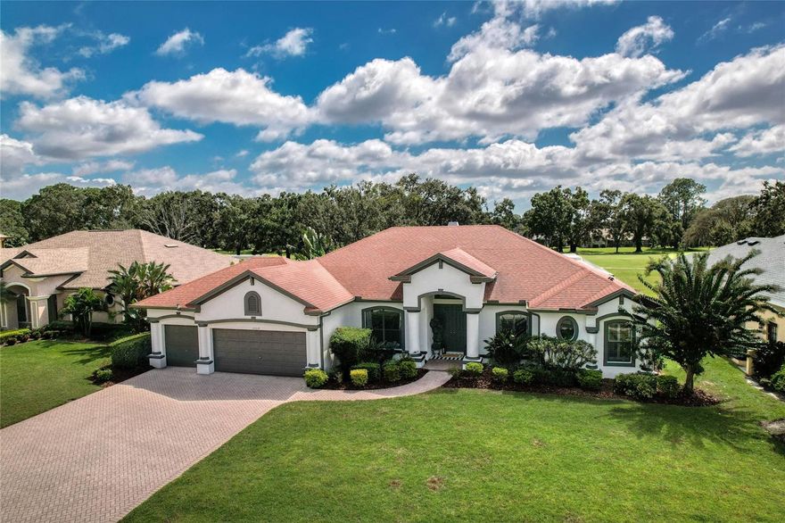 The Eagles near Westchase! NEW LISTING! This is the one you've been waiting for! Discover this CUSTOM-BUILT SINGLE-STORY HOME by local builder LARSON (2005), positioned on a coveted GOLF COURSE LOT in the 24-hour guard-gated Eagles community near Westchase. This 4-BEDROOM, 3-BATHROOM home with 3-CAR GARAGE and DEDICATED OFFICE features a BRAND-NEW 5-TON AC SYSTEM (July 2025), FRESH INTERIOR AND EXTERIOR PAINT (2025), and ALL-NEW FLOORING in most areas of the home (2025).

Step inside to discover LUXURY VINYL PLANK FLOORING flowing through the common areas, complemented by PLUSH CARPET in the family room and bedrooms, while TILE graces the bathrooms and laundry room. The OPEN FLOOR PLAN showcases elegant TRAY CEILINGS in the family room and front living and dining rooms that add character and space, while CROWN MOLDING in the formal living room and NEW BASEBOARDS (2025) complete the refreshed look throughout. The inviting family room centers around a COZY PROPANE FIREPLACE, and the kitchen/family room combo is perfect for entertaining with lots of CABINETS, a LARGE ISLAND with BREAKFAST BAR, and EAT-IN SPACE. Throughout the home, you'll appreciate the ELEGANT PLANTATION SHUTTERS which add both beauty and functionality.

The popular TRIPLE SPLIT FLOOR PLAN offers exceptional privacy and functionality. The PRIMARY BEDROOM features a stunning TRAY CEILING and PLANTATION SHUTTERS, plus a LUXURIOUS EN SUITE BATHROOM with TILED SHOWER, GARDEN TUB, and LARGE DOUBLE VANITY. Bedrooms 2 and 3 are located off the kitchen and family room combo, sharing Bathroom 2. Bedroom 4 is positioned at the rear across from Bathroom 3, which offers convenient POOL AREA ACCESS.

Your BACKYARD OASIS features a SPARKLING POOL AND SPA, complemented by a PAVED DECK and SCREENED-IN LANAI overlooking the golf course. This outdoor space provides the perfect Florida lifestyle with STUNNING FAIRWAY VIEWS as your daily backdrop.

ENTERTAINMENT AND SECURITY FEATURES elevate this home's appeal with SPEAKERS thoughtfully installed in the family room (Bose) and ATRIUM SPEAKERS in the formal dining room, primary bedroom, pool area, and garage for seamless audio throughout your daily living spaces. Convenient SCHLAGE ELECTRONIC KEYPAD ENTRY LOCKS provide secure, keyless access at both the garage-to-home door and pool-to-pool bath door.

This home offers SOLID VALUE with recent investments including UPDATED LANDSCAPING for enhanced curb appeal and a NEWER ROOF (2021). The property presents beautifully with MANICURED GROUNDS set against the scenic golf course setting.

Located within The Eagles, a premier gated golf community, residents enjoy 24/7 security, two championship golf courses, an elegant clubhouse with restaurant, playground, basketball courts, and tennis and pickleball courts. The vibrant community hosts events, festive holiday golf cart parades, and an annual garage sale. With HOA fees of just $129/month and no CDD fees, The Eagles offers outstanding value.

This home is zoned for HIGHLY-RATED SCHOOLS including MARY BRYANT ELEMENTARY, FARNELL MIDDLE, and SICKLES HIGH SCHOOL, and is just minutes from Racetrack Road, Tampa International Airport, and Florida's world-renowned beaches.

Schedule your private showing today!