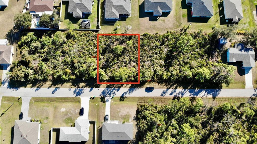 Photo of 12141 Wellington Avenue, Port Charlotte, FL 33981 (MLS # C7520321)