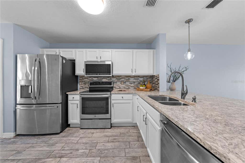 Photo of 2705 Emerald Lake Ct #2705, Kissimmee, FL 34744 (MLS # S5153755)
