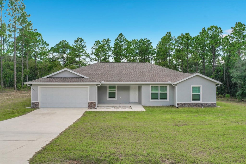 Photo of 8294 SW 123rd Terrace, Dunnellon, FL 34432 (MLS # W7888965)