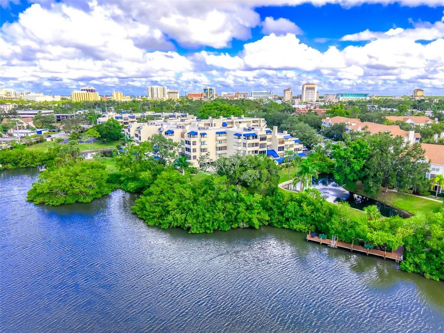 Welcome to Paradise! Central Park is a unique condominium community - conveniently located on 6 acres of beautifully landscaped grounds in the center of Sarasota. Residents have access to the waters of Hudson Bayou & Sarasota Bay. This Condo features 2 bedrooms & 2 bathrooms in 1,260sf. Located on the 3rd Floor, just steps from the Elevator, you will enjoy EXPANSIVE VIEWS of lush trees, gardens, waterways & fountain. This exquisite residence has been METICULOUSLY REMODELED, stylishly well-appointed to provide a modern environment with classic charm. Enjoy a myriad of delightful upgrades - New Hurricane Rated Windows, Remodeled Kitchen, New HVAC System & Water Heater, remodeled Master Bathroom & Guest Bathroom, New Ceiling Fans, New Microwave, Stove & Washer/Dryer. Natural LIGHT!! Delight in an abundance of daily SUNLIGHT through LARGE WINDOWS & FRENCH DOORS! Two Private BALCONIES provide outdoor dining or relaxing options. The Main Living Room is Magnificent! A comfortable Living Area openly flows into a bright Sunroom (which can be used as a Dining Room). This room is surrounded by windows & offers access to the main Private Balcony. The modern Kitchen has been re-designed to feature a single-level Breakfast Bar, Quartz Countertops & Backsplash. Relax in the spacious & luxurious Primary Bedroom Suite, with sunny walls of French Doors & access to the private Balconies. The Primary Bathroom features a new step-in Shower, Double Sinks & Water Closet. The Laundry Closet is conveniently located in the hallway, leading to the Walk-In Closet. A private second Bedroom in the front of the unit provides sleeping space for your guests – or an office or TV room for your own use. A second Bathroom is accessible from the front hallway area. This unit conveys with a Designated Parking Space in the Garage & a Private Storage Room on the 2nd Level. The Central Park community features a private Boat Dock & Kayak Launch area for water sports enthusiasts & an Outdoor Pool to accommodate a daily swim. The PERFECT LOCATION! A short walk to Main Street Sarasota’s fine dining restaurants, upscale shops and diverse cultural attractions – arts, music, theatre, museums & dance. Just minutes from Selby Gardens, St. Armands Circle as well as the extraordinary, nationally-acclaimed Gulf Beaches of Siesta Key, Lido Key & Longboat Key. A Dynamic & Rejuvenating Florida Lifestyle awaits – Experience the satisfaction of residing in a Prime Sarasota Location - featuring Refined Living Enhancements, Sunshine, Water Views & Daily Convenience.