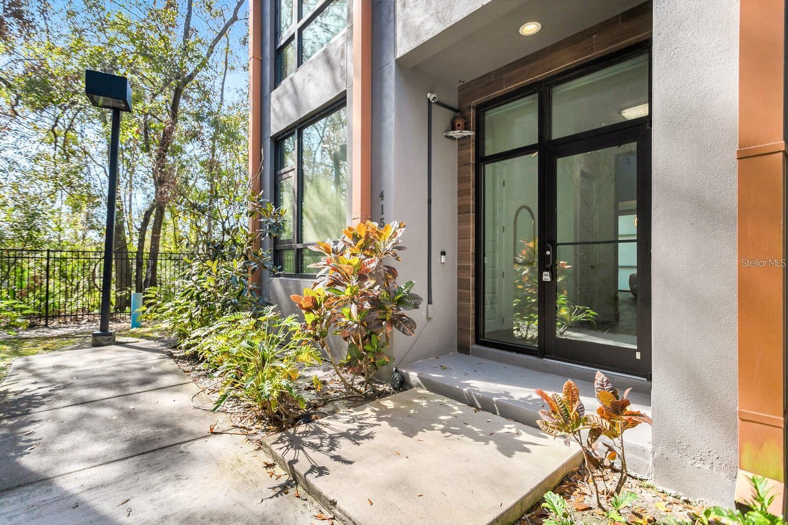GATED COMMUNITY! Location & Privacy! This modern and renovated home is located in the heart of Tampa, Carrollwood. With an open floor concept floor plan, this townhome includes 3 bedrooms, 3 baths, an open den/office space centered with a spiral staircase that leads you to a spacious rooftop oasis, perfect for relaxing or entertaining loved ones. With this modern design you automatically see all the glass allowing in natural sunlight which have been improved with electric/manual shades. The updated family room also exhibits an electric fire place and nature views . The Laundry closet is conveniently located upstairs next to the primary and secondary bedroom. Fully renovated master bathroom which includes extra large rainfall shower. Both additional Bedrooms also have an ensuite bathroom. Kitchen features ample storage and a breakfast bar. Located just off Dale Mabry Hwy and the Veterans Expressway with easy access to Tampa International Airport, Raymond James, Westshore and the new Midtown Tampa. This location offers city centralization and tranquility and privacy all at the same time. Don't miss out on this exclusive opportunity! Some furnishing options available* Information provided upon request.