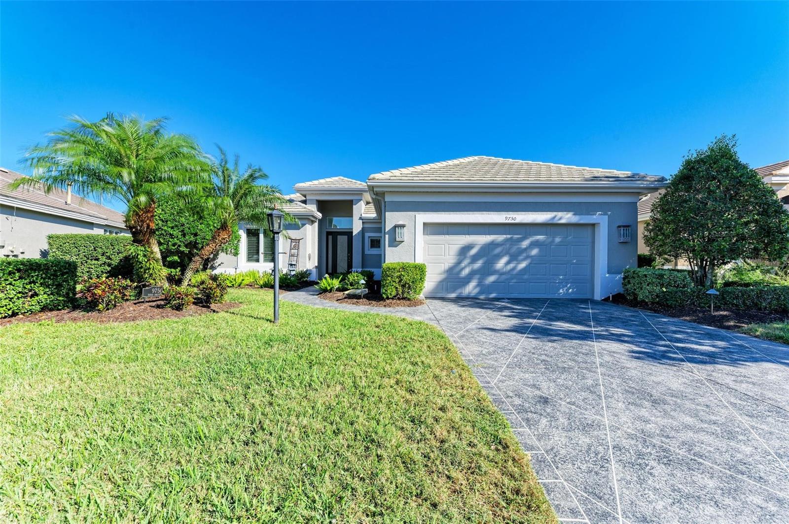 Bring us an offer!!! Charming 3-bedroom, 2-bath home offers the perfect blend of comfort and convenience Featuring an open floor plan, the spacious living areas are designed to promote a seamless flow throughout. This home sits on a beautifully landscaped lot accented with landscaping lighting with mature trees and plants that require minimal upkeep, providing year-round beauty without the hassle. Spacious kitchen with light cabinetry with custom hardware, Corian counter tops, stainless steel appliances, cafe’ area, walk-in pantry, and planning desk make this perfect for planning and entertaining. The light and bright great room and dining area are surrounded with windows so to enjoy that Florida sunshine. Master suite has separate door to lanai, spacious walk-in closet, with master bath features of designer dual vanities, jet tub, walk-in shower. Step outside and enjoy your private oasis featuring a saltwater pool, perfect for relaxation or entertaining. Whether it's swimming or lounging in the sun, the pool area becomes an extension of your living space. Other notable features are crown molding throughout, plantation shutters, built-in sound system, whole house water filter system, gutter guard system, tankless water heater to name a few. In addition to the two-car garage, the property also includes a side-load golf cart garage, ideal for those who enjoy golfing or need extra storage. This home is perfect for those who value low-maintenance living, convenience, and a touch of luxury. Whether you're seeking an active or a more relaxed environment, Rosedale has something to offer each member with this community. With the social membership to the Rosedale Golf & Country Club, you can enjoy amenities of tennis, bocce courts, 22,000 square foot clubhouse with a heated junior-size Olympic swimming pool, fitness center and daily workout classes and access to personal trainers. The Clubhouse features a full-service restaurant that hosts numerous social events and activities throughout the year. For the avid golfer, Rosedale Golf and Country Club offers various levels of golf membership. HOA fees conveniently include cable & internet, yard care maintenance, exterior painting, roof cleaning, 2-24/7 manned gates, and 2 dog parks. A meticulously maintained community conveniently located just east of I-75 off SR-70 - centrally located to restaurants, UTC mall, the Sarasota/Bradenton airport, great schools, convenient to top Doctors and Hospitals, and some of the best beaches in the country! No CDD fees! Schedule your tour of this home today.
